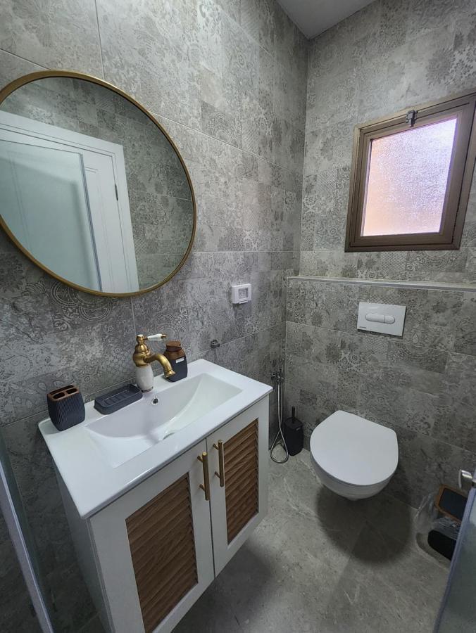 Garden Apartments. Mas'ada Bagian luar foto